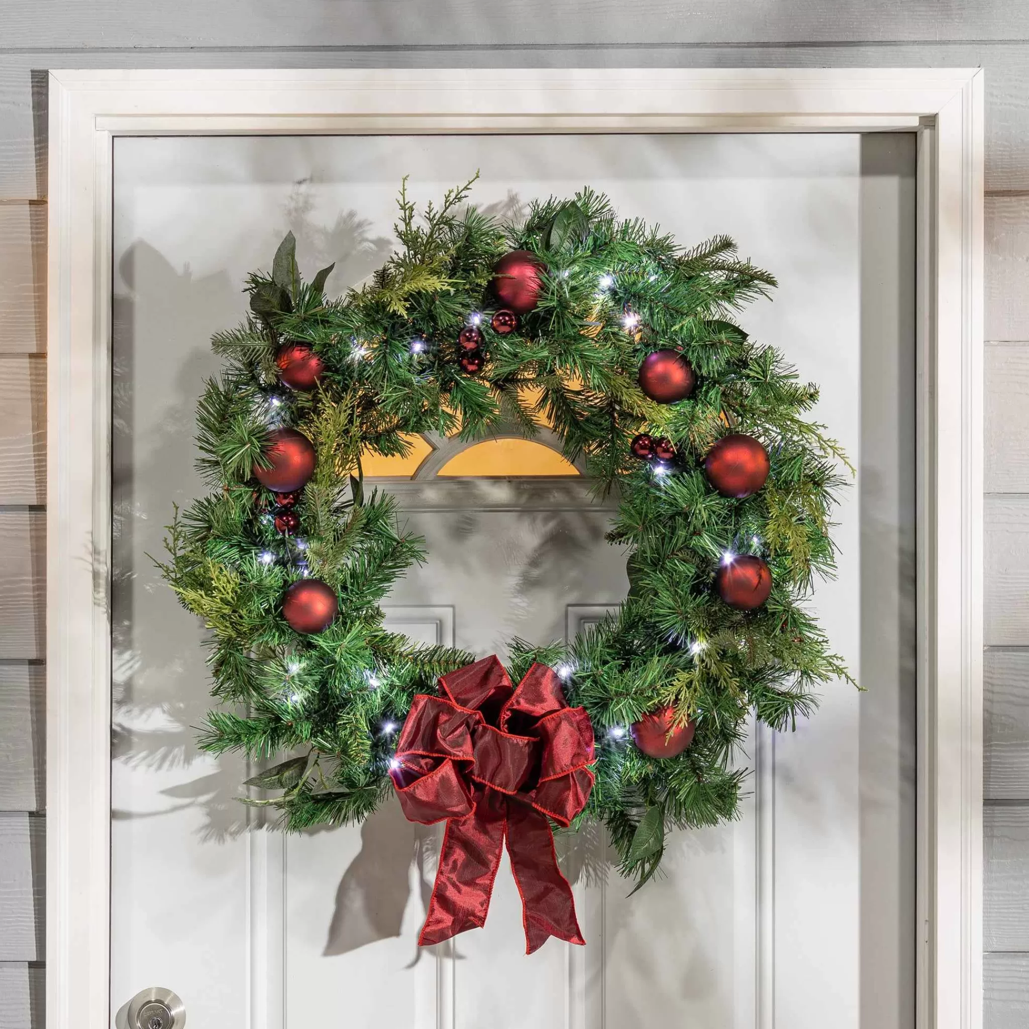 Gerson International 32 In Holiday Cedar Wreath With Red Bow And Christmas Ornaments