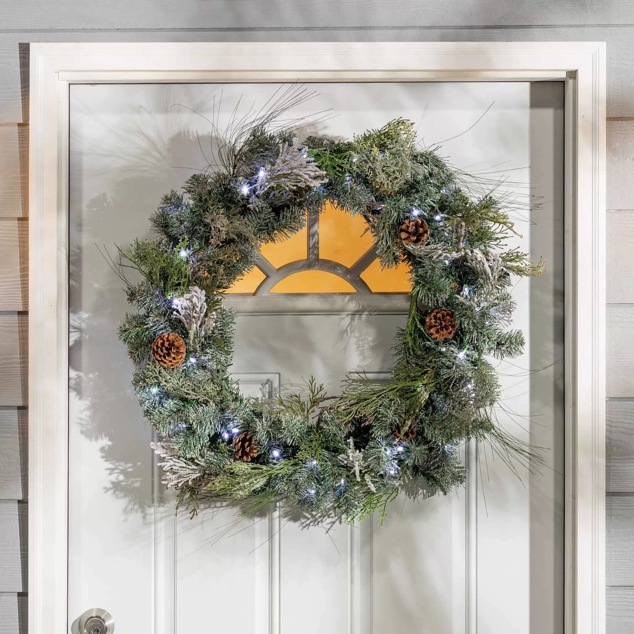 Gerson International 32"D Pre-Lit Snowy Mixed Pine Wreath Withpine Cones, Twig & Cedar Accents. 50 Cool White Led Lights.