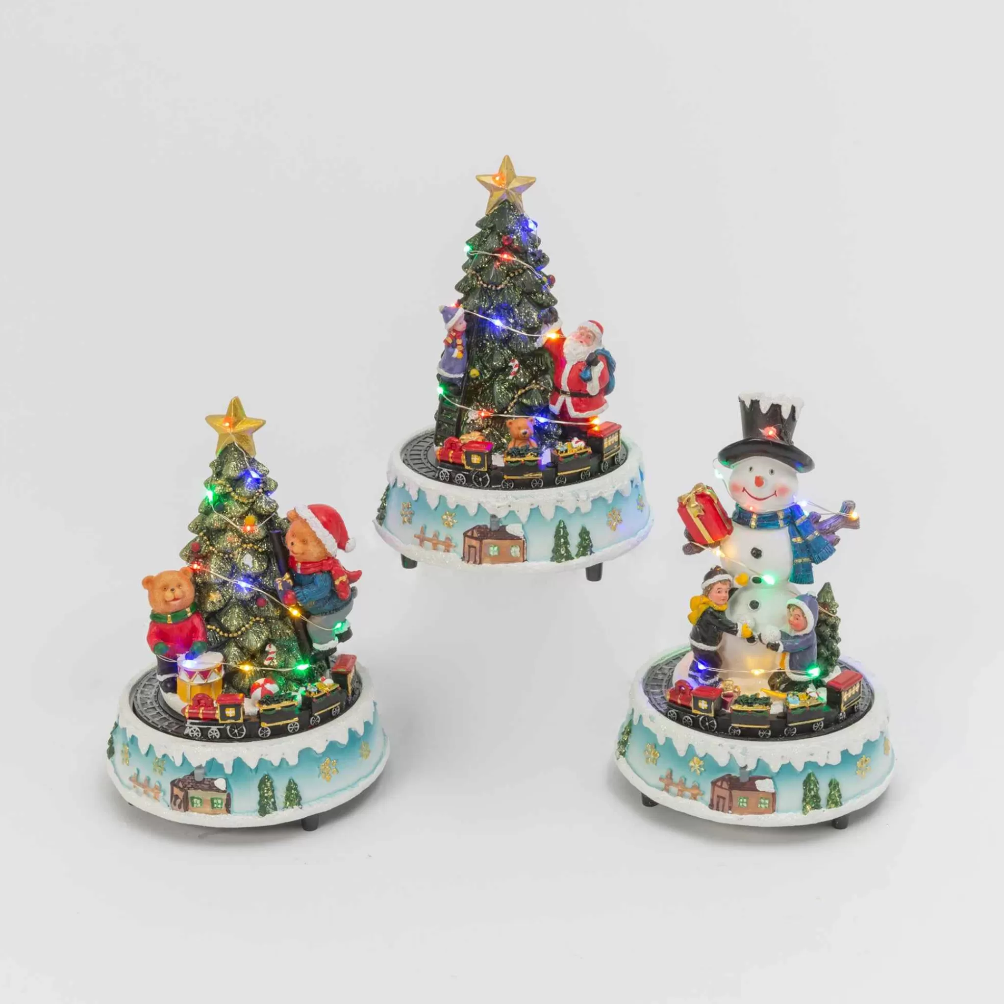 Gerson International Set Of 3 Light-Up Musical Trains With Snowman And Trees