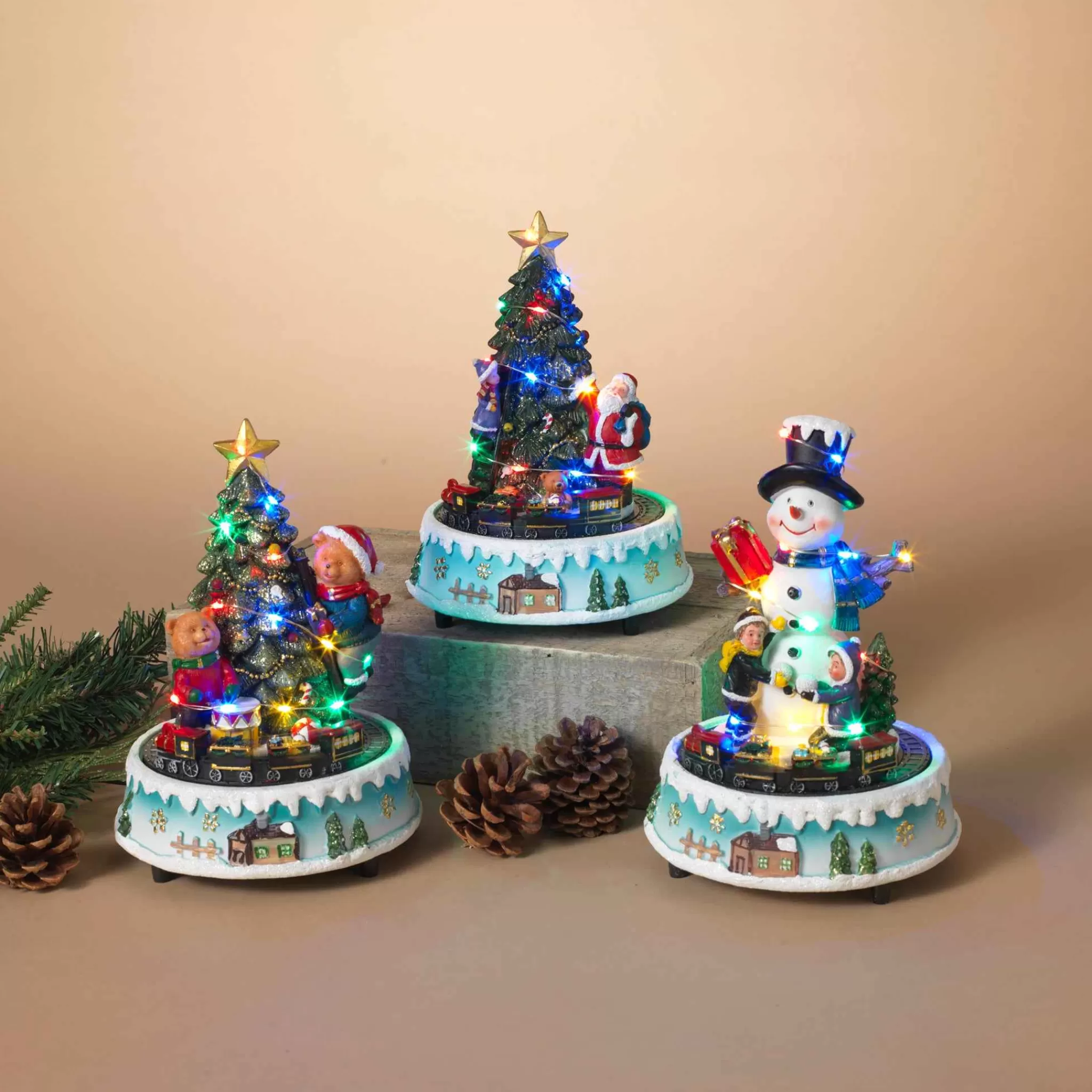 Gerson International Set Of 3 Light-Up Musical Trains With Snowman And Trees