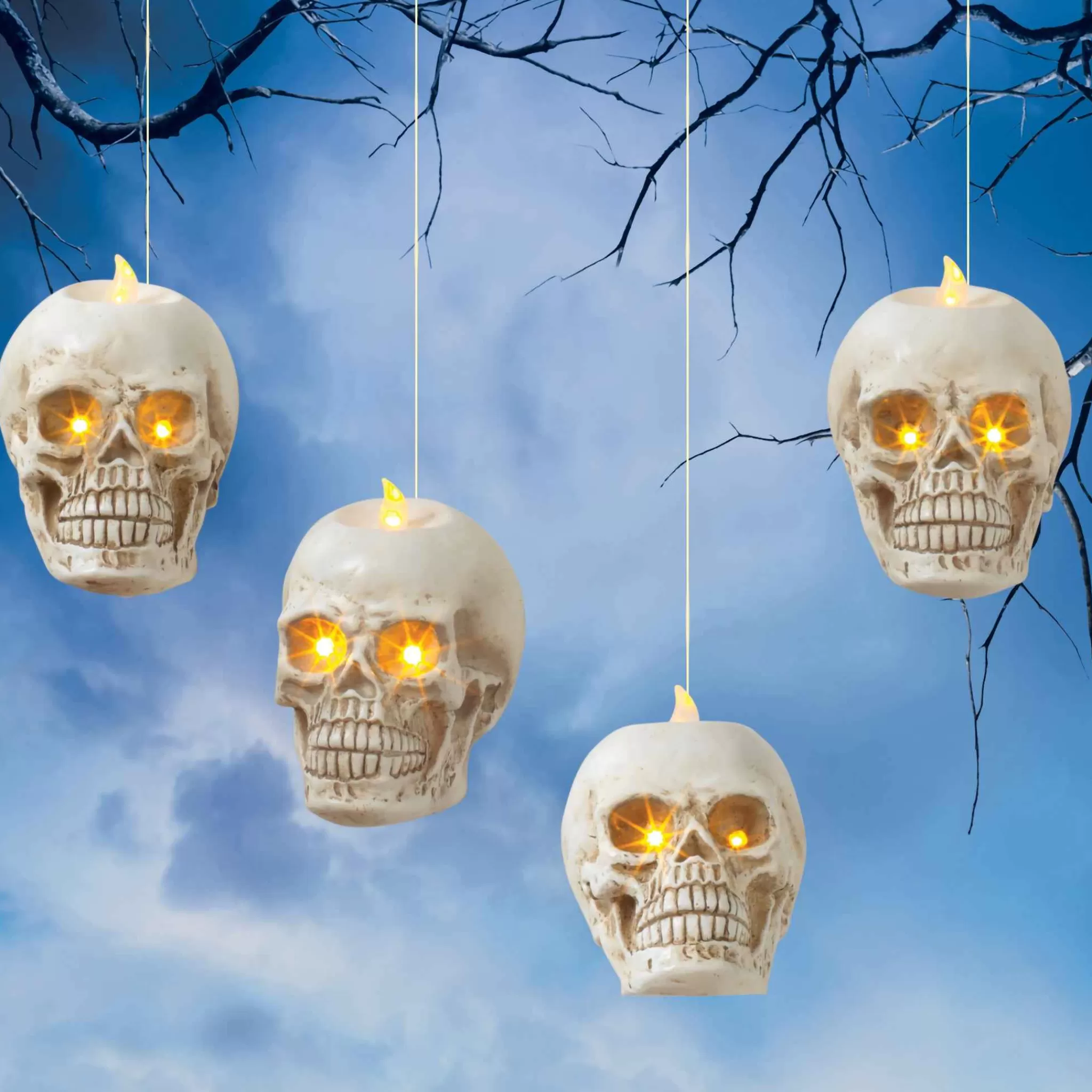 Gerson International Set Of 4 Floating Halloween Skull Candles With Remote, Timer