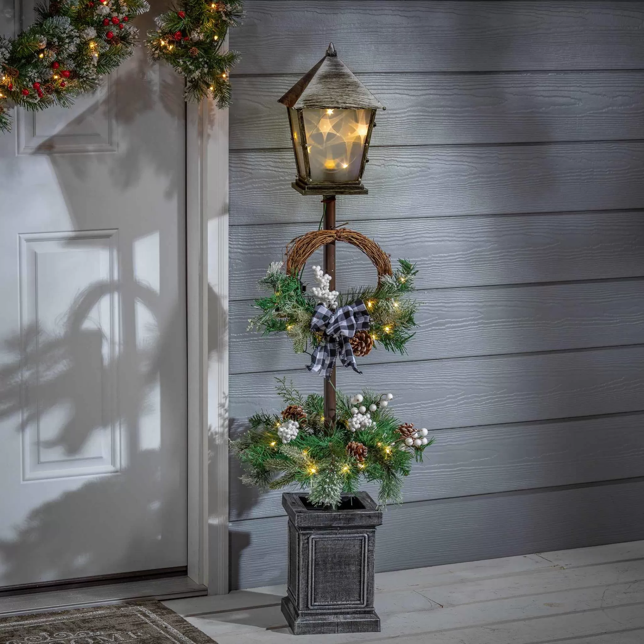 Gerson International Vintage Lantern Post With Wreath And Micro Led Lights, Timer